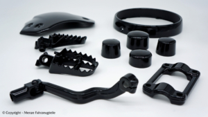 Triumph Scrambler Teile mit Pulverbeschichtung in schwarz glänzend